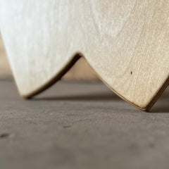Close-up of the Norst Surf Balance Board fish tail in birch plywood