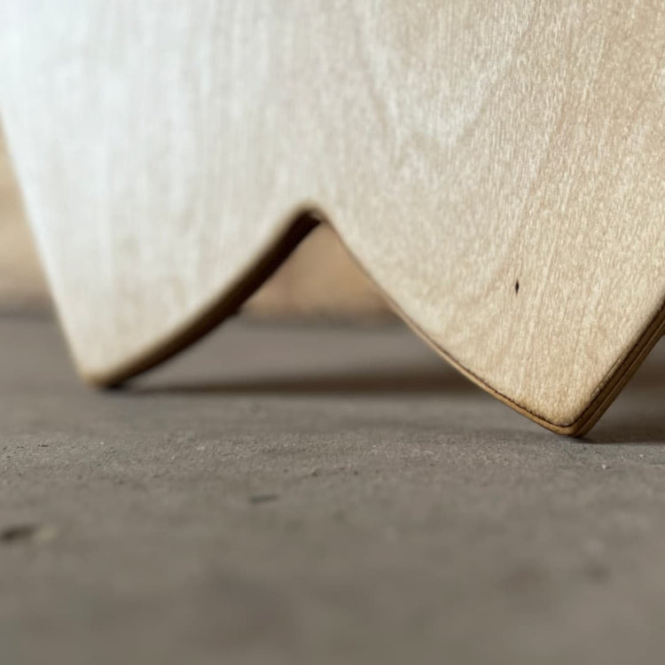 Close-up of the Norst Surf Balance Board fish tail in birch plywood