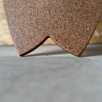 Close-up of the Norst Surf Balance Board fish tail, cork top deck