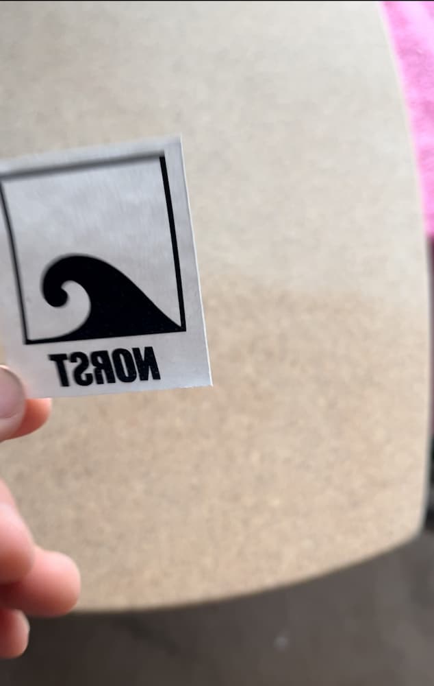 Applying the brand logo onto Norst Balance Boards