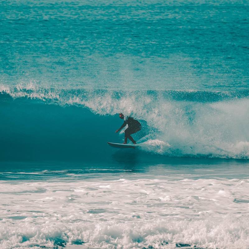 A surfer riding a wave.